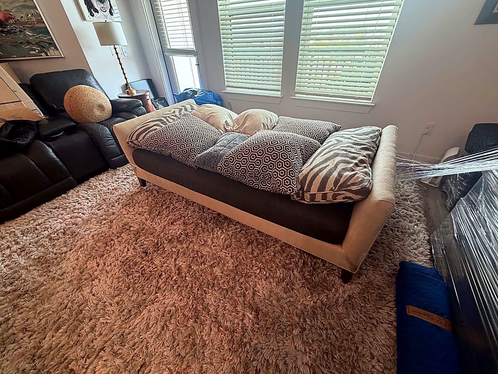Living room staged for packing during a Beach House Moving job in Inlet Beach, FL