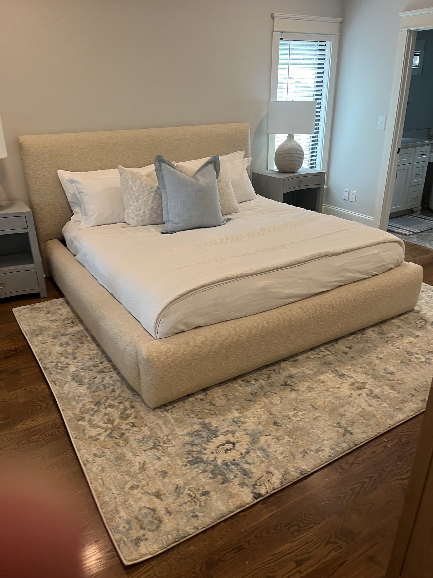 Luxury primary bedroom fully set up by Beach House Moving after a white-glove move-in on the Emerald Coast
